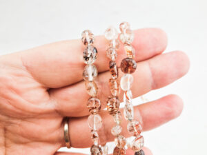 Rutielkwarts trommelsteen armband