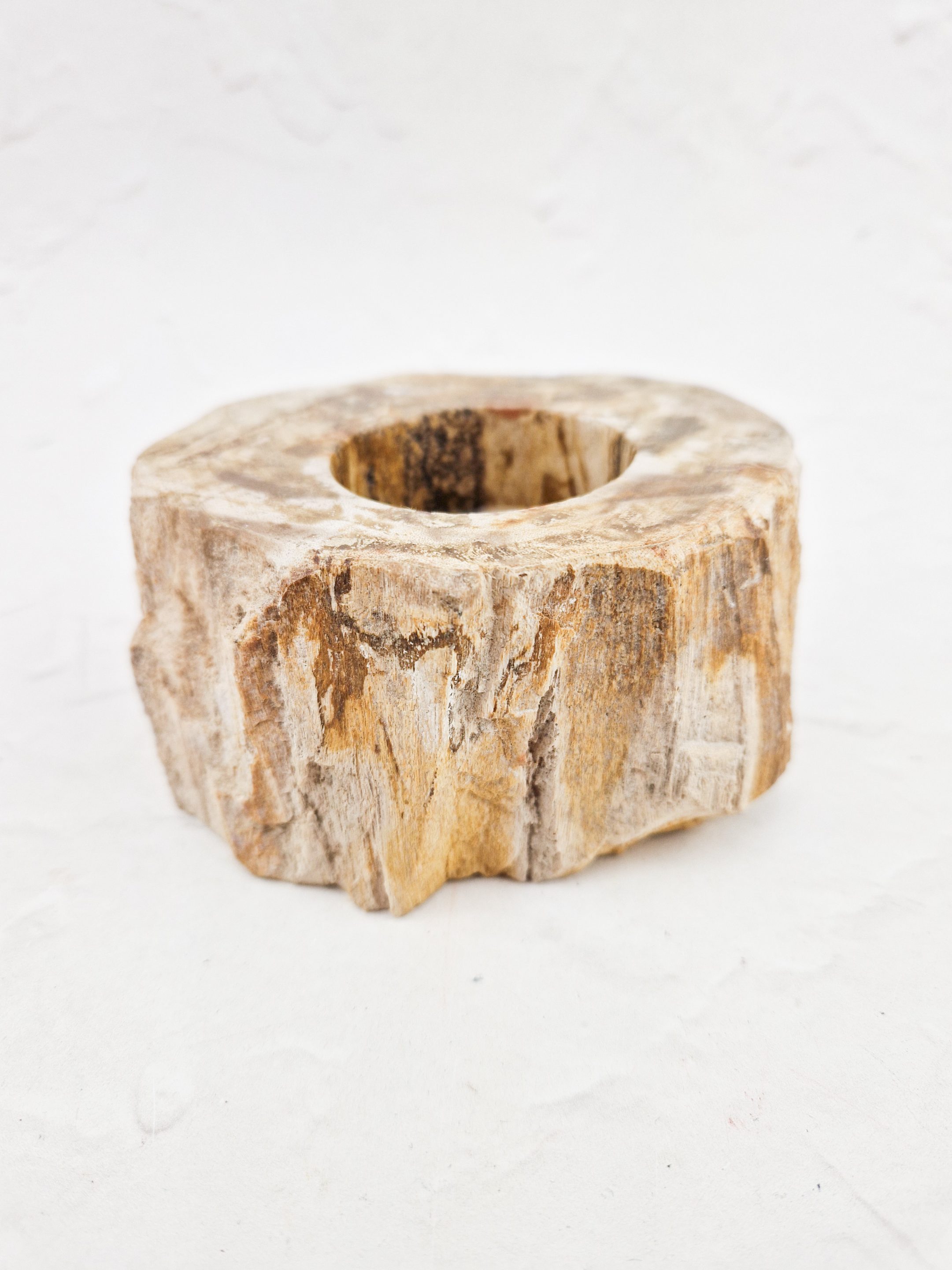 Versteend hout waxinelichthouder