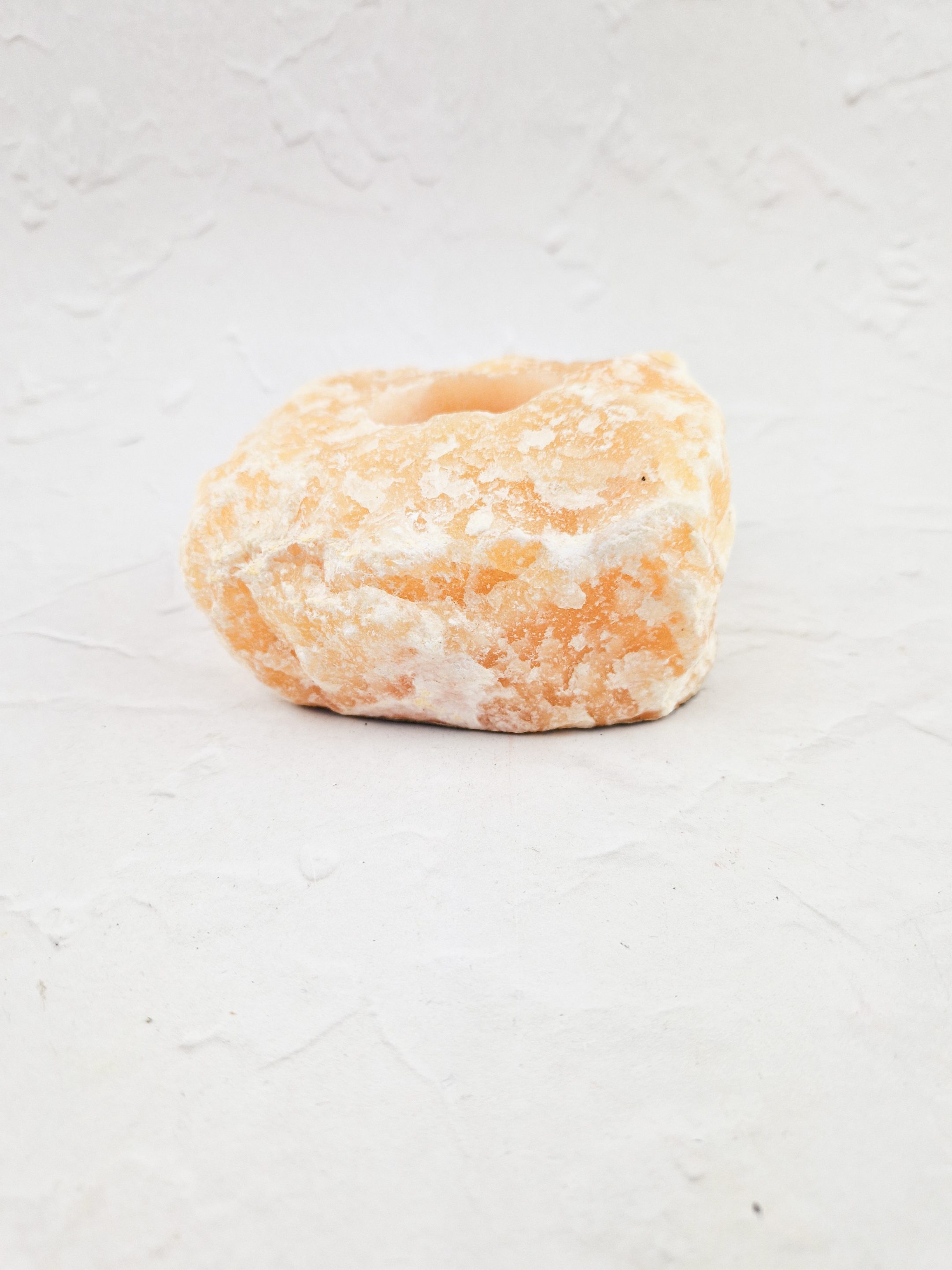 Oranje calciet waxinelichthouder