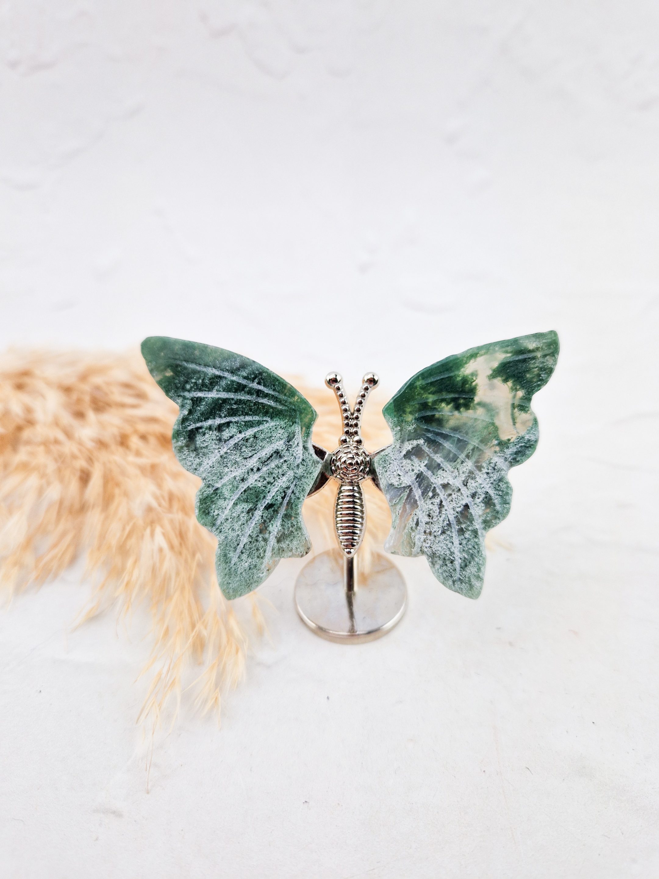 Vlindertje op standaard (mosagaat)