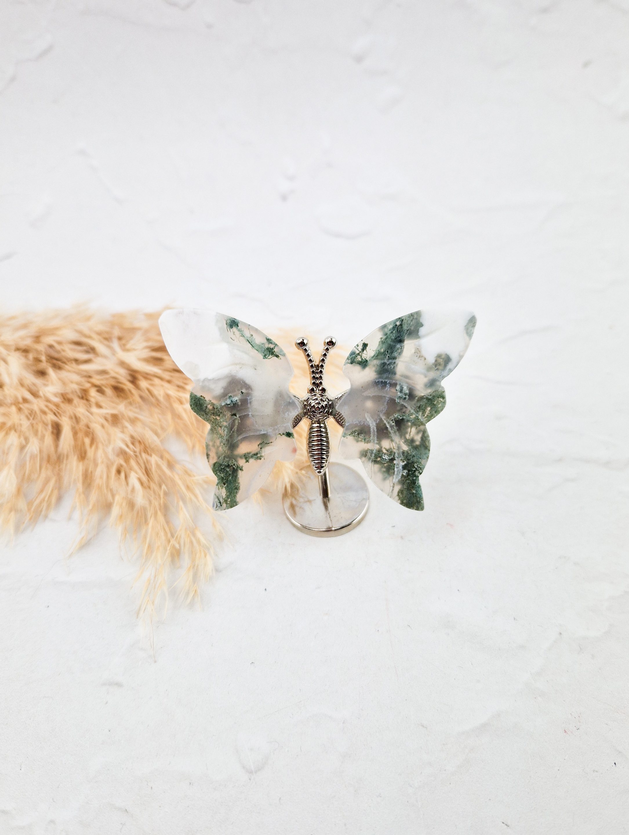 Vlindertje op standaard (mosagaat)